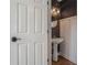 Stylish powder room featuring geometric wallpaper, pedestal sink, and modern lighting at 1032 Lena Nw St, Atlanta, GA 30314