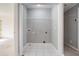 Empty closet space with white tiled floors and wire shelving at 1032 Lena Nw St, Atlanta, GA 30314