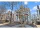 Beautiful view of the front of the two story home showcasing its inviting double porch at 1032 Lena Nw St, Atlanta, GA 30314