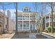Charming two-story home featuring a double porch, light blue siding, and inviting curb appeal at 1032 Lena Nw St, Atlanta, GA 30314