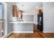 Modern kitchen features a breakfast bar, stainless steel appliances, and ample counter space at 1032 Lena Nw St, Atlanta, GA 30314