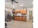 Open kitchen featuring stainless steel appliances, light countertops, and wood cabinets at 1032 Lena Nw St, Atlanta, GA 30314