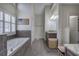 Bathroom featuring a large bathtub, vanity, and tiled floor at 2139 Golden Morning Ct, Kennesaw, GA 30152