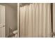 A bathroom with a standing shower and neutral-colored decor at 2139 Golden Morning Ct, Kennesaw, GA 30152
