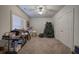 Spacious bedroom with a large window, a ceiling fan, and a closet space at 2139 Golden Morning Ct, Kennesaw, GA 30152