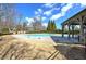 Community pool and recreation area with a pavilion, mature trees, and landscaping, perfect for relaxing outdoors at 2139 Golden Morning Ct, Kennesaw, GA 30152