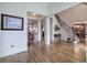 Spacious foyer with hardwood floors, staircase, and elegant architectural details at 2139 Golden Morning Ct, Kennesaw, GA 30152