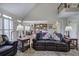 Bright living room with hardwood floors, view of kitchen, and comfortable seating at 2139 Golden Morning Ct, Kennesaw, GA 30152
