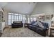Bright and airy living room with vaulted ceilings, large windows and comfortable seating, perfect for relaxation at 2139 Golden Morning Ct, Kennesaw, GA 30152
