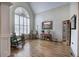 Inviting living room featuring hardwood floors, a large window and stylish décor at 2139 Golden Morning Ct, Kennesaw, GA 30152
