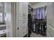 Walk-in closet with custom shelving and ample storage space at 2139 Golden Morning Ct, Kennesaw, GA 30152