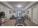 Well-equipped home workout room featuring various exercise machines and ample space at 2139 Golden Morning Ct, Kennesaw, GA 30152