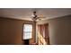 Bedroom features include a window, closet and ceiling fan light combination at 46 Mac Johnson Nw Rd, Cartersville, GA 30121