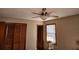 Bedroom features include a ceiling fan, closet and a window with natural light at 46 Mac Johnson Nw Rd, Cartersville, GA 30121