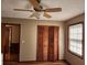 Bedroom features include a ceiling fan, closet and a window with natural light at 46 Mac Johnson Nw Rd, Cartersville, GA 30121