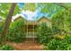 The home's multiple back porches and decks are surrounded by lush mature landscaping at 730 Jackson Miller Cir, Powder Springs, GA 30127
