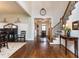 Elegant foyer featuring hardwood floors, a staircase with iron railings, and a view of the front door at 730 Jackson Miller Cir, Powder Springs, GA 30127