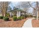 Community gazebo sitting amidst lush landscaping and a sidewalk at 730 Jackson Miller Cir, Powder Springs, GA 30127