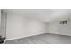 Finished basement featuring wood-look floors and a window at 2450 Spring Mill Cv, Duluth, GA 30097