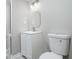 Bathroom featuring a white vanity and toilet at 2450 Spring Mill Cv, Duluth, GA 30097