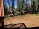 Exterior shot of backyard and trees from deck at 2678 Brook Park Way, Atlanta, GA 30340