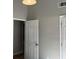 A bright bedroom features fresh paint, plush carpeting, and a ceiling light at 2678 Brook Park Way, Atlanta, GA 30340