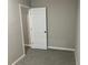 Bright bedroom with neutral walls and fresh carpeting offers a calming space at 2678 Brook Park Way, Atlanta, GA 30340