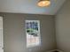 Bedroom with neutral walls, plush carpeting, and a window with natural light at 2678 Brook Park Way, Atlanta, GA 30340