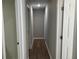 Hallway showing interior doors and wood floor at 2678 Brook Park Way, Atlanta, GA 30340