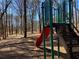 The property features a playground with stairs and a red slide at 2678 Brook Park Way, Atlanta, GA 30340