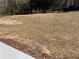 View of the property's expansive yard and surrounding trees at 2678 Brook Park Way, Atlanta, GA 30340