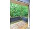 Balcony with a metal railing and view of the surrounding trees at 115 Biscayne Dr # C2, Atlanta, GA 30309