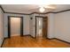 Bedroom featuring hardwood floors, neutral walls and a closet at 115 Biscayne Dr # C2, Atlanta, GA 30309