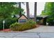 Arborgate Condominiums entrance featuring lush landscaping and clear signage at 115 Biscayne Dr # C2, Atlanta, GA 30309