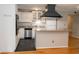 Updated kitchen featuring stainless steel appliances, granite countertops, and a breakfast bar at 115 Biscayne Dr # C2, Atlanta, GA 30309