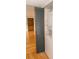 Laundry area with stacked washer and dryer behind a louvered closet door at 115 Biscayne Dr # C2, Atlanta, GA 30309