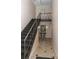 Entry hall featuring an elegant stairway with patterned carpeting and stylish decor at 115 Biscayne Dr # C2, Atlanta, GA 30309