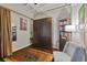 Cozy bedroom featuring a murphy bed, industrial ceiling, and a comfortable seating area at 805 Peachtree Ne St # 614, Atlanta, GA 30308