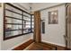 Hallway featuring a large window and a view to other parts of the home at 805 Peachtree Ne St # 614, Atlanta, GA 30308