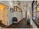 Hallway with hardwood floors, elegant decor, and natural light from clerestory windows at 805 Peachtree Ne St # 614, Atlanta, GA 30308