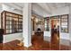 Hallway with hardwood floors and industrial ceiling leads to the rest of the home at 805 Peachtree Ne St # 614, Atlanta, GA 30308