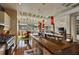 Gourmet kitchen with stainless appliances and an island with bar seating overlooks the dining and living areas at 805 Peachtree Ne St # 614, Atlanta, GA 30308