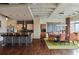 Stylish kitchen with modern appliances, a tile backsplash, and bar seating flowing into the dining area at 805 Peachtree Ne St # 614, Atlanta, GA 30308