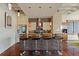 Beautiful kitchen featuring stainless steel appliances, custom cabinetry, and a tiled kitchen island with bar stools at 805 Peachtree Ne St # 614, Atlanta, GA 30308