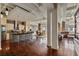 Bright open-concept living space with modern kitchen, dining area, and inviting living room with exposed duct work at 805 Peachtree Ne St # 614, Atlanta, GA 30308
