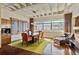Cozy living and dining space with hardwood floors, stylish furniture, and large windows for great natural light at 805 Peachtree Ne St # 614, Atlanta, GA 30308