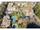 An aerial view of the property with the tennis court and swimming pool at 1250 Parkwood Se Cir # 2114, Atlanta, GA 30339