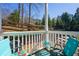 Cozy back porch featuring wooded views, outdoor seating, and a peaceful ambiance at 1250 Parkwood Se Cir # 2114, Atlanta, GA 30339