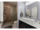 Modern bathroom with a tiled shower, vessel sink, and stylish fixtures at 1250 Parkwood Se Cir # 2114, Atlanta, GA 30339