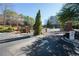 A gated community entrance with brick pillars and iron gate at 1250 Parkwood Se Cir # 2114, Atlanta, GA 30339